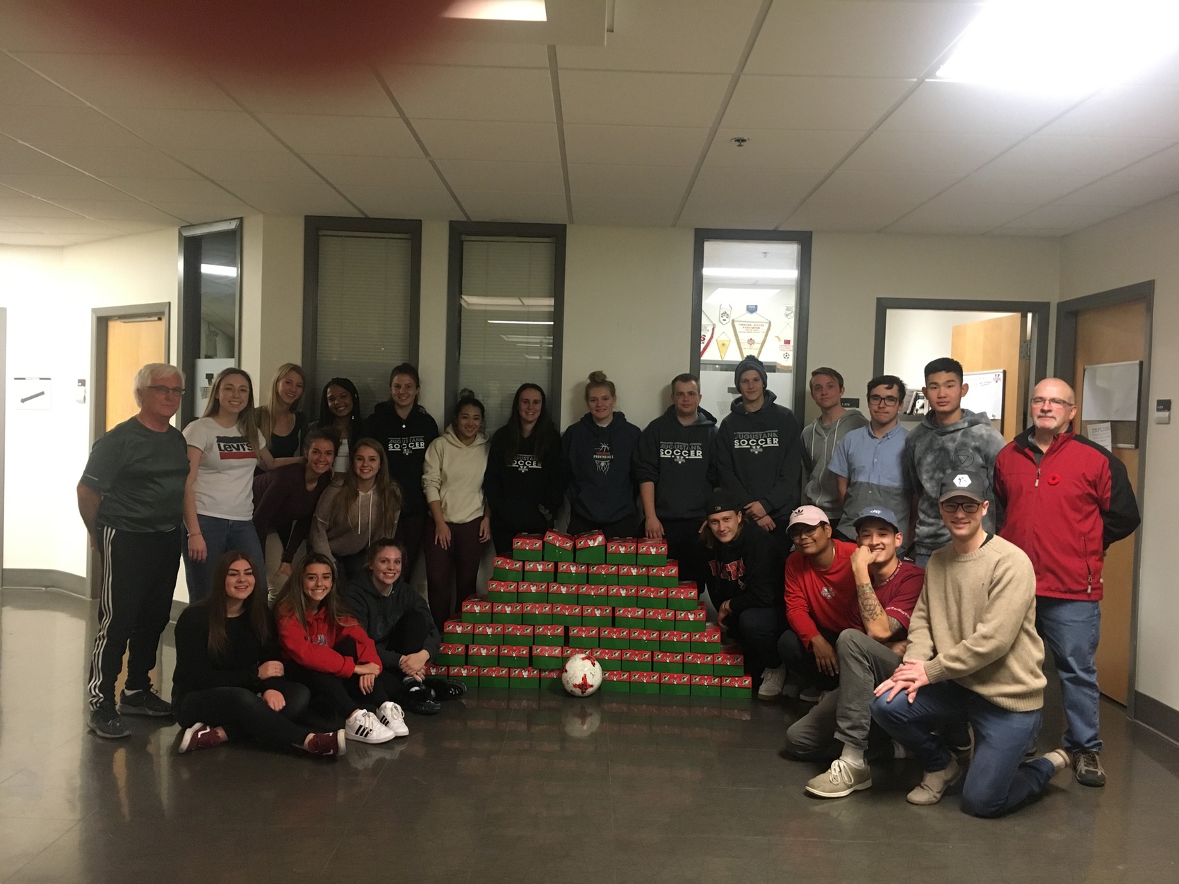 The men and women's soccer teams got together for the third year to fill boxes for Operation Christmas Child.